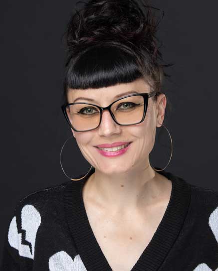 smiling woman wearing glasses