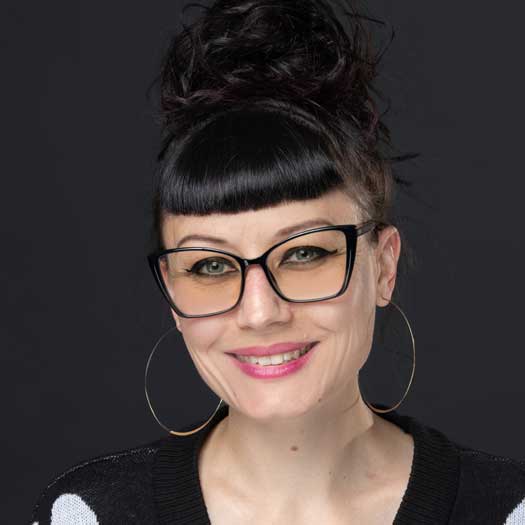 smiling woman wearing glasses