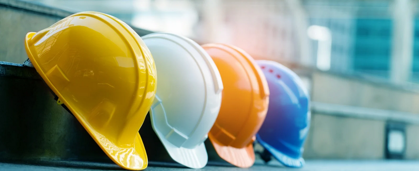 row of colored hard hats