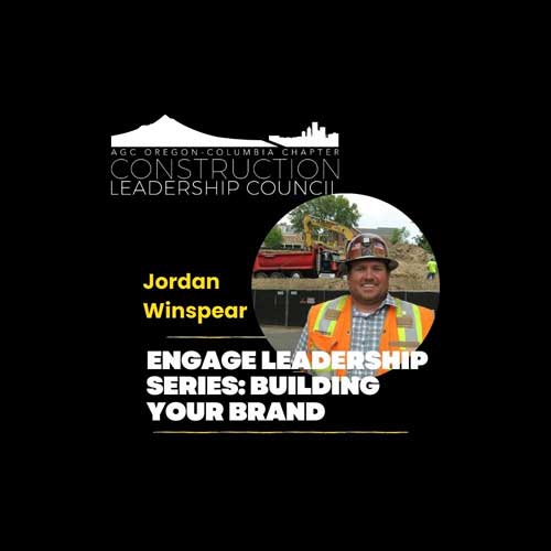 smiling man wearing hard hat and safety vest